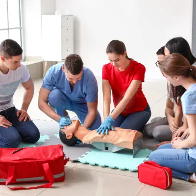 group of people practicing cpr