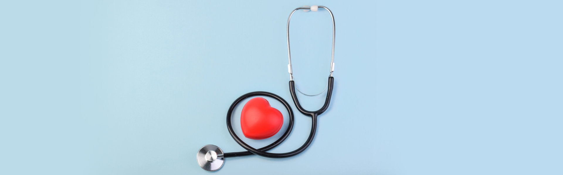 A stethoscope and a heart-shaped thing